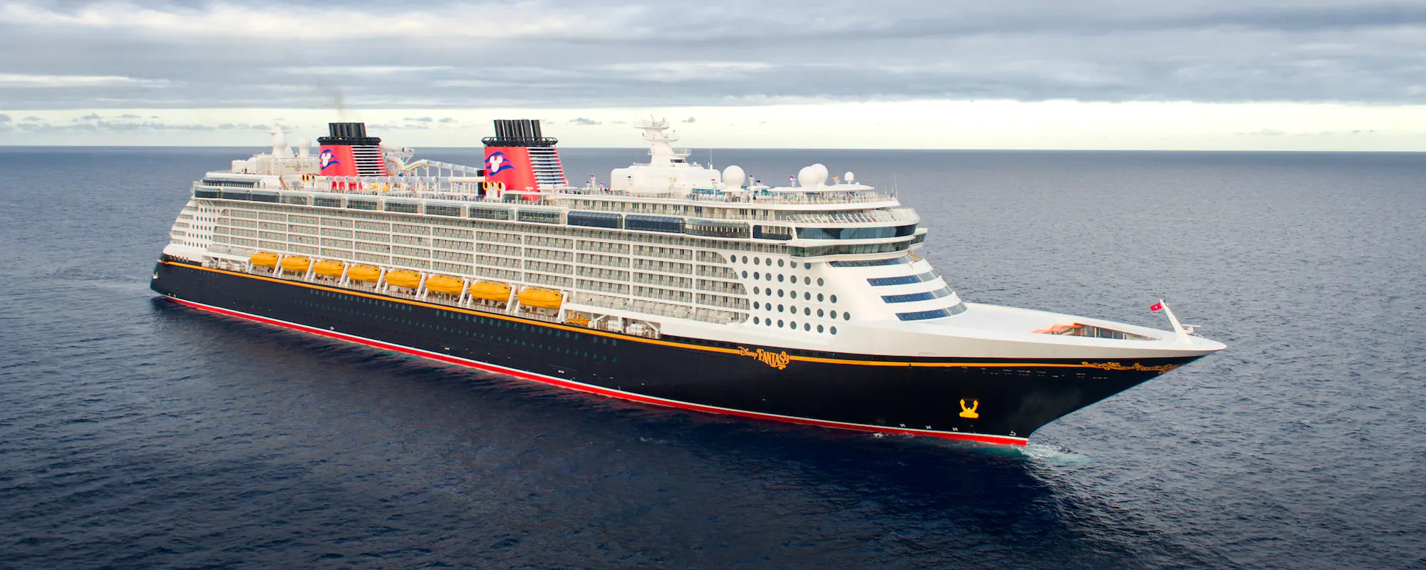 Stunning view of Disney Fantasy - Expert travel planning and vacation packages available