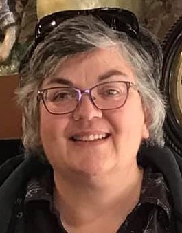 Portrait photo of Mary, travel agent