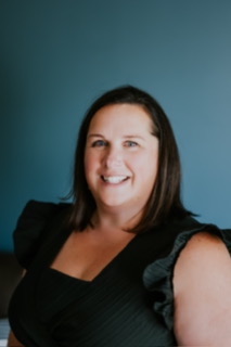 Portrait photo of April, travel agent