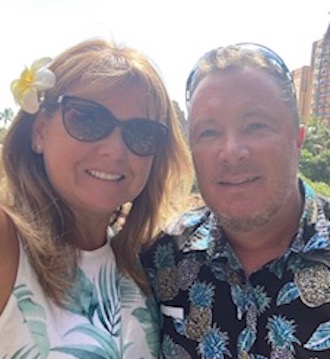 Portrait photo of Gina and Alec, travel agent