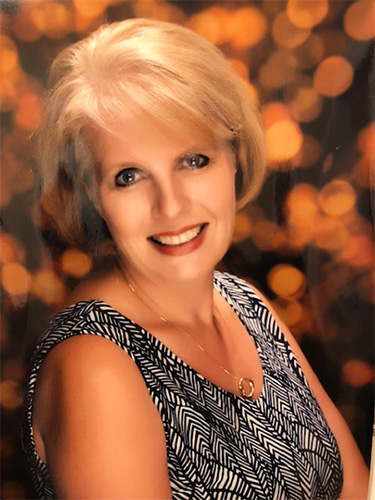 Portrait photo of Denise, travel agent